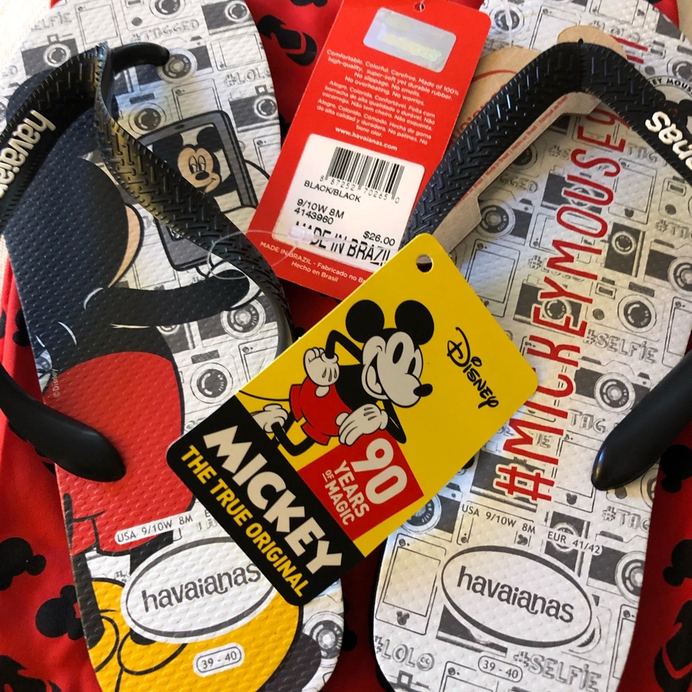 New!  Never worn with tags Size 8 Mickey Mouse flip flops with bag